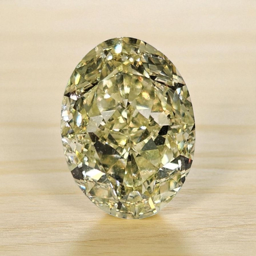 Our Newest Fancy Light Yellow Oval Diamond