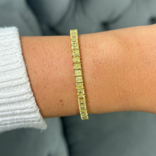 Fancy yellow diamond elongated radiant cut bracelet. Cushion diamond bracelet. radiant tennis bracelet. Yellow diamond jewelry. Yellow tennis bracelet. Natural yellow diamond jewelry