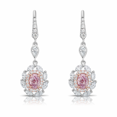 Ethereal pink diamond earrings. pink diamonds. pink diamond jewelry. pink diamond studs. pink diamond drop earrings. pink and white diamond earrings. pink diamond ovals.