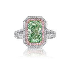 Unique elongated radiant natural green diamond ring. JLO green diamond.