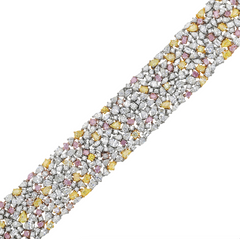 Luxurious multi-color diamond bracelet featuring pink, yellow, and white diamonds in a unique design.