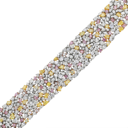 Luxurious multi-color diamond bracelet featuring pink, yellow, and white diamonds in a unique design.