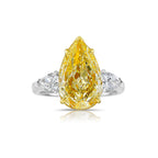 Three stone engagement ring, yellow diamond ring, yellow diamond engagement ring, three stone diamond ring, yellow pear diamond, pear shape diamond, pear shape engagement ring.