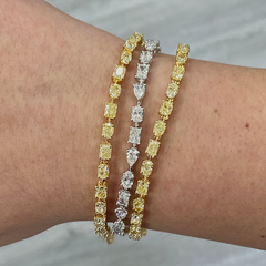 Fancy intense yellow diamond bracelet. Yellow diamond multi shape bracelet. Yellow diamond tennis bracelet. Canary diamond bracelet. Yellow diamond multi shape. Natural yellow diamond bracelet