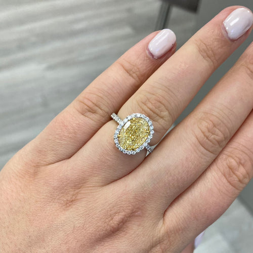yellow diamond ring. yellow diamond oval ring. yellow diamond halo ring.