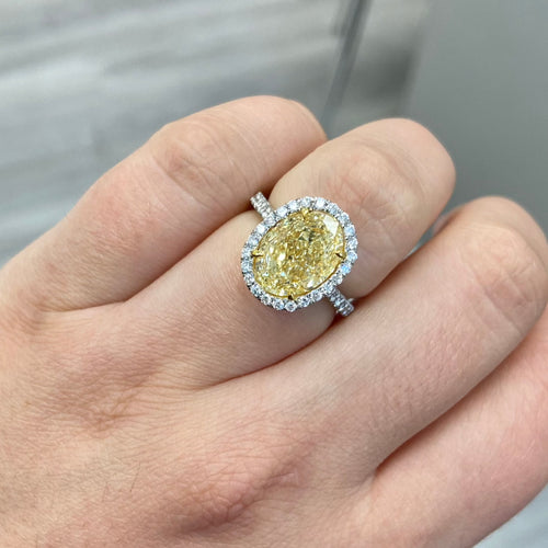 yellow diamond ring. yellow diamond oval ring. yellow diamond halo ring.