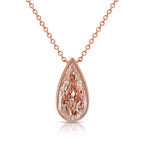 Rose gold teardrop diamond necklace on a white background