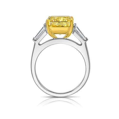 Luxurious yellow elongated radiant diamond engagement ring with a stunning hue with a VVS2 clarity.