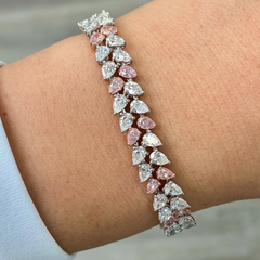 Fancy pink and white pear shape diamond double row bracelet with VS-SI clarity.