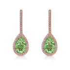Elegant green pear-shaped diamond drop earrings in 18k rose gold, framed by a halo of white diamonds.
