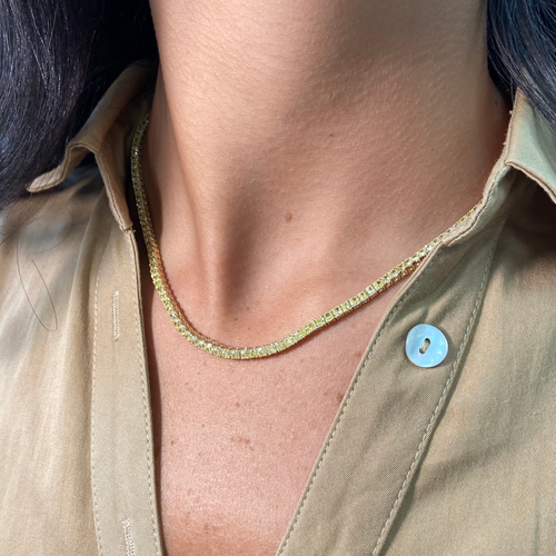 Natural intense yellow diamond tennis necklace with cushion cut diamonds set in 18k yellow gold.