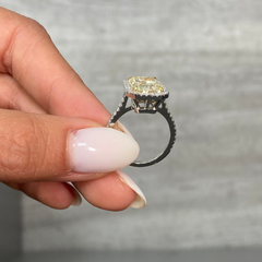 5 Carat Light Yellow elongated radiant cut in halo diamond ring