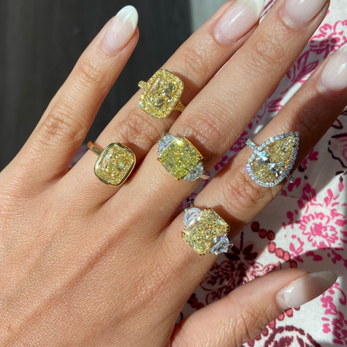 5.62ct Fancy Yellow Cushion Diamond Three Stone Ring