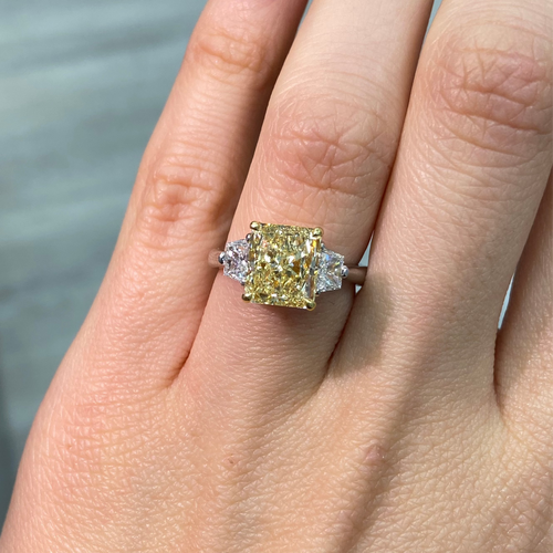Fancy yellow engagement ring, three stone diamond ring, yellow diamond ring, yellow radiant diamond.