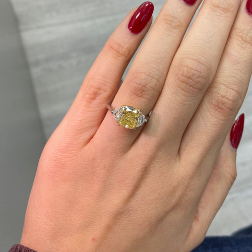 3 Carat Fancy Yellow VVS1 Cushion Diamond 3 Stone Ring, unique engagement ring style.