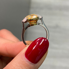 3 Carat Fancy Yellow VVS1 Cushion Diamond 3 Stone Ring, unique engagement ring style.