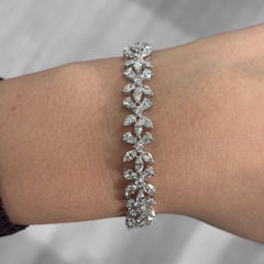 Elegant white diamond bracelet. tennis bracelet. floral diamond bracelet.
