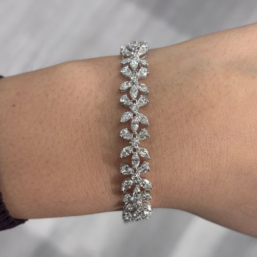 Elegant white diamond bracelet. tennis bracelet. floral diamond bracelet.