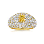 GIA certified elongated yellow diamond surrounded by white diamonds ring.
