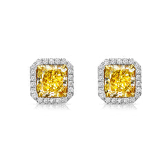 Old money yellow diamond earrings. yellow diamond studs. fancy yellow diamonds. fancy yellow diamond studs earrings. yellow diamond halo earrings.