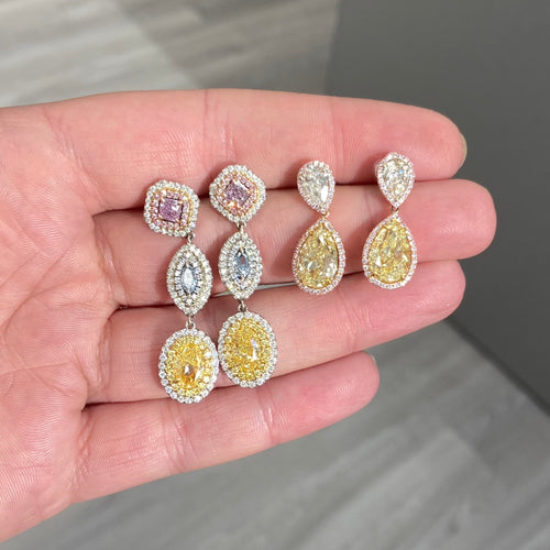 fancy colored diamonds. fancy colored diamond earrings. blue and pink diamonds. pink diamonds. blue diamonds. yellow diamonds. blue diamond earrings.