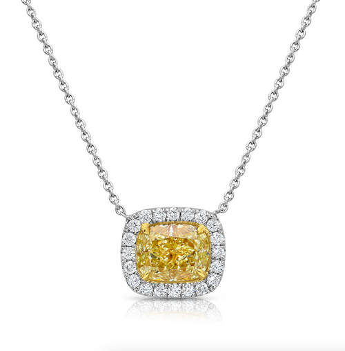 Stunning natural yellow diamond Necklace with White Halo diamonds and a VVS1 clarity.