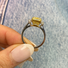 A GIA certified diamond ring with a elegant yellow diamond color.