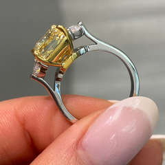 Fine Yellow diamond engagement ring featuring a GIA certified diamond.