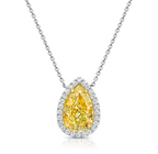 Pear shape yellow diamond with white halo diamonds and a VVS2 clarity.