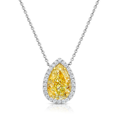 Pear shape yellow diamond with white halo diamonds and a VVS2 clarity.