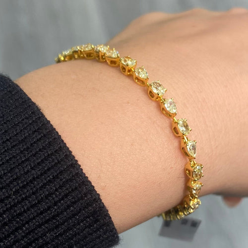 Fancy intense yellow diamond bracelet. Yellow diamond multi shape bracelet. Yellow diamond tennis bracelet. Canary diamond bracelet. Yellow diamond multi shape. Natural yellow diamond bracelet