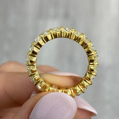 Oval diamond eternity ring. Yellow diamond oval eternity ring. Yellow diamond band. Canary diamond band. Yellow oval diamonds. Fancy yellow oval diamond ring. Yellow diamond stackable rings.