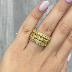 Oval diamond eternity ring. Yellow diamond oval eternity ring. Yellow diamond band. Canary diamond band. Yellow oval diamonds. Fancy yellow oval diamond ring. Yellow diamond stackable rings.