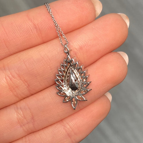 Intense yellow pear shape. Gia certified intense yellow diamond. Yellow diamond necklace. Unique yellow diamond necklace. Yellow diamond pear shape necklace.