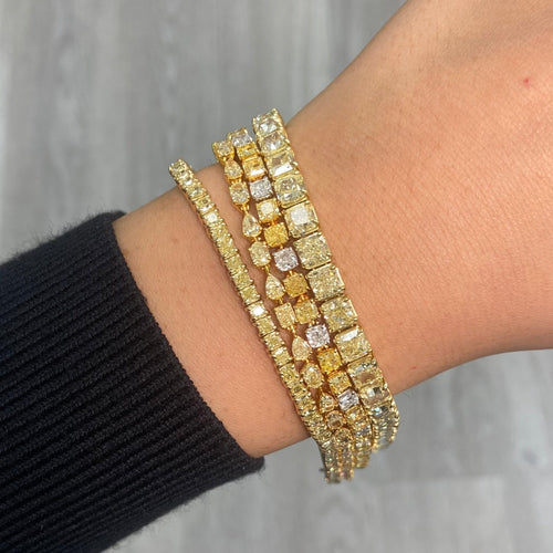 Fancy intense yellow diamond bracelet. Yellow diamond multi shape bracelet. Yellow diamond tennis bracelet. Canary diamond bracelet. Yellow diamond multi shape. Natural yellow diamond bracelet