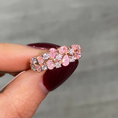Fine pink and white diamond ring with mixed cuts, offering elegance and a unique design.