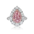 Natural pink diamond, pear shape diamond engagement ring.