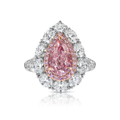 Natural pink diamond, pear shape diamond engagement ring.