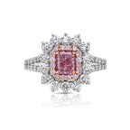 Fancy purplish pink radiant cut diamond ring with diamond halo.