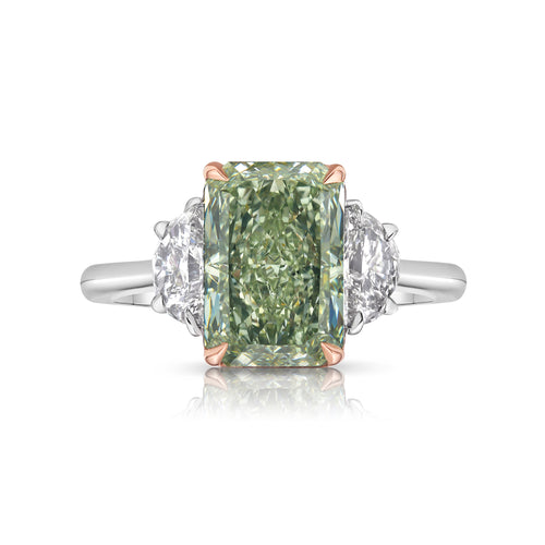 GIA-certified greenish yellow diamond ring with a radiant cut center stone and VVS2 clarity.