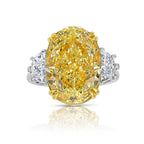 Elegant oval-cut fancy yellow diamond engagement ring with GIA certification and VS2 clarity.