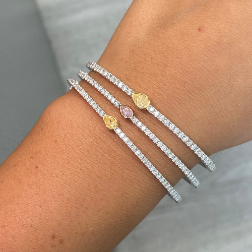 GIA certified fancy light pink bangle bracelet.