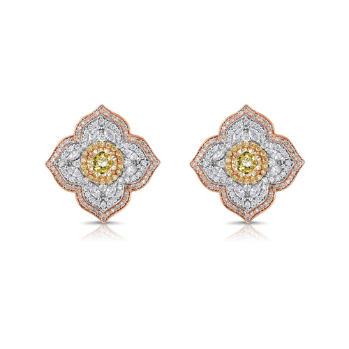 Light yellow and fancy light yellow diamond studs, in a flower theme with 1.5 carats of surrounding white and yellow diamonds.
