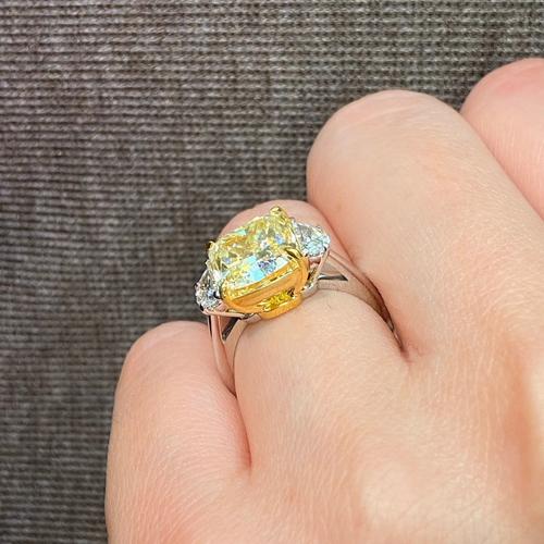 Elongated yellow diamond ring crafted in platinum and 18k yellow gold
