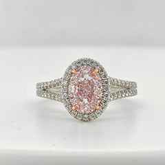 Ethereal natural pink diamond oval shaped ring, GIA certified.
