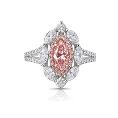 Pink marquise diamond ring with white pear shape diamonds surrounding.