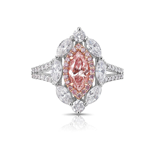 Pink marquise diamond ring with white pear shape diamonds surrounding.