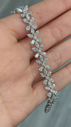 Elegant white diamond bracelet. tennis bracelet. floral diamond bracelet.