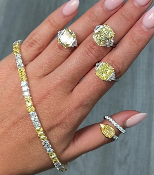 5 Carat Yellow Emerald Cut Diamond Three Stone Ring