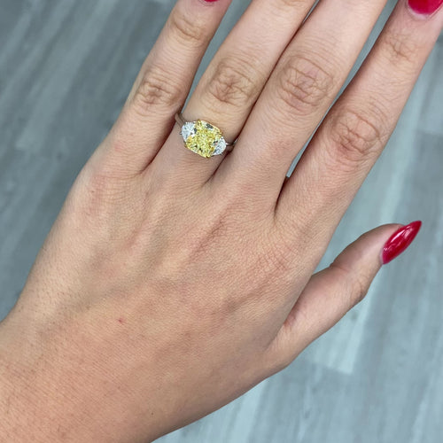 3.03 Carat Center Fancy Yellow Cushion Cut Center VS2 Clarity  0.33 Carat F Half Moons GIA Certified Diamond Crafted in Platinum and 18k Yellow Gold Handmade in NYC